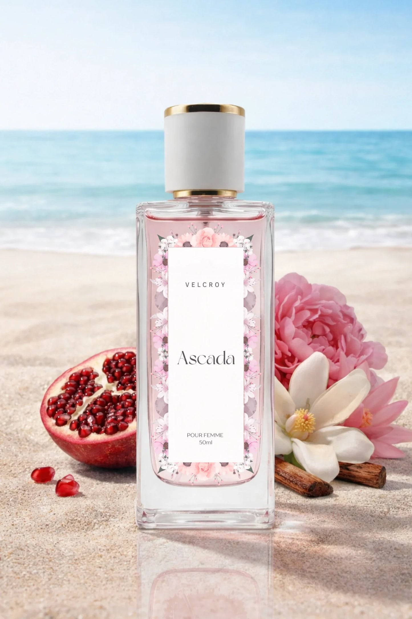 Luxury floral perfume bottle on beach sand with pomegranate, pink peony, and magnolia flowers
