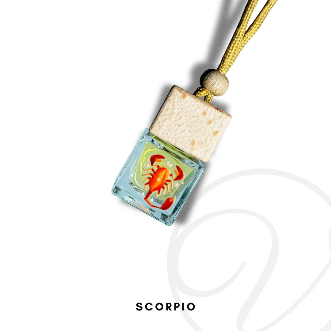 Scorpio zodiac car air freshener with wooden cap and red scorpion image on glass bottle
